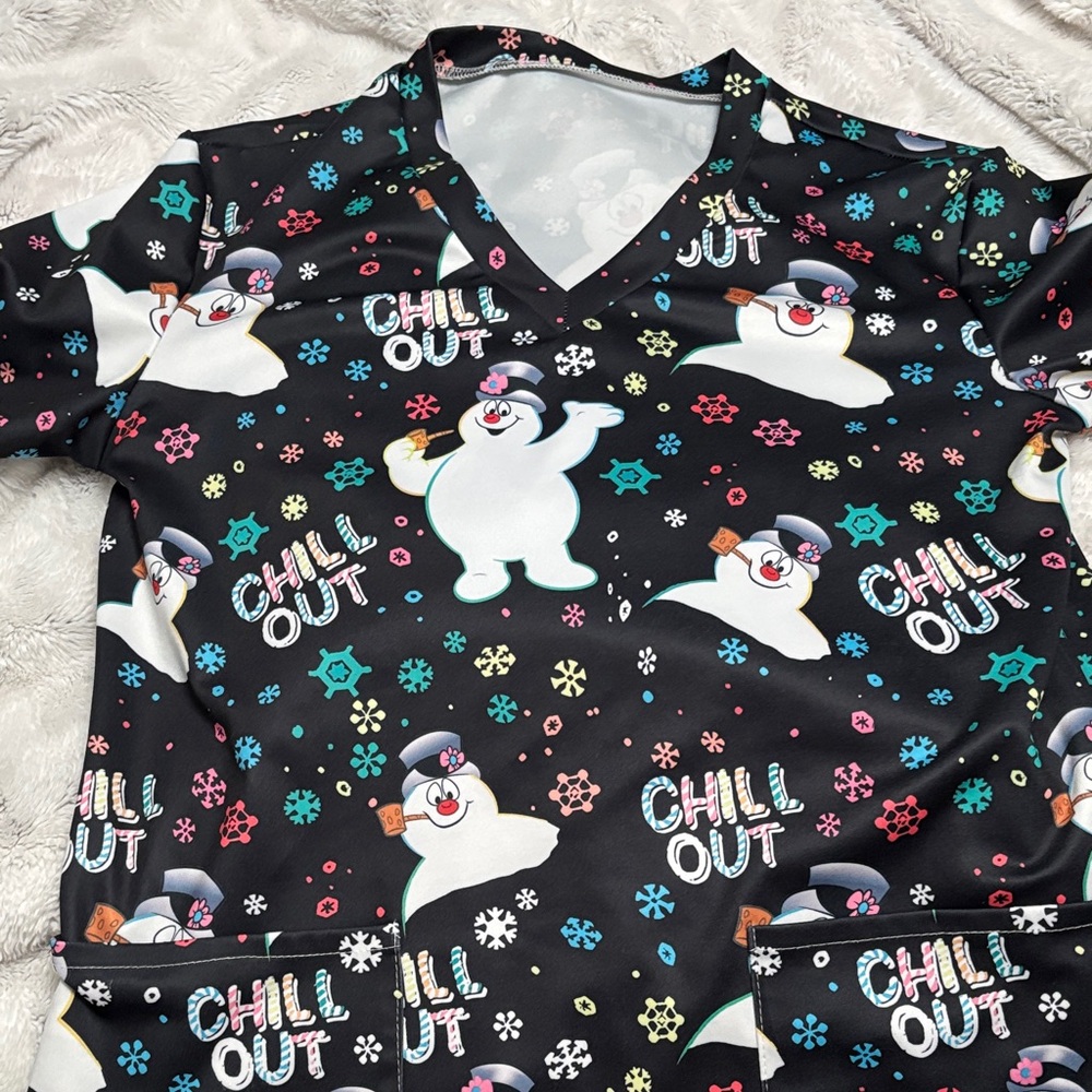 Women’s frosty the snowman scrub top